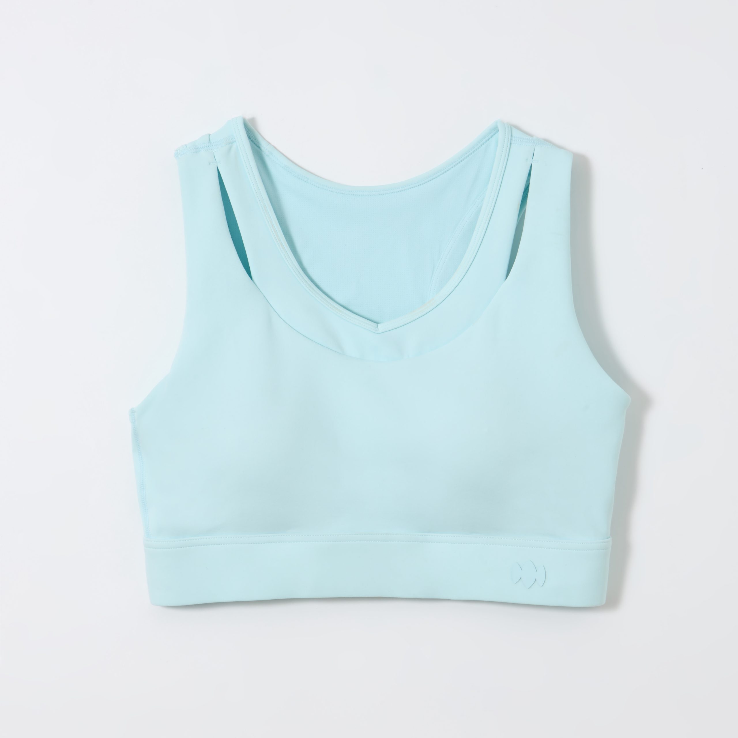 Microscopic comparison of stretch fabric weaves showing needle damage