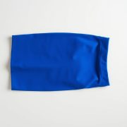Flat lay of royal blue invisible scrunch leggings folded neatly on a neutral surface, invisible scrunch leggings Australia.