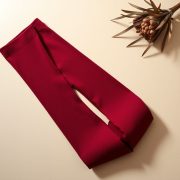 Burgundy scrunch bum leggings sale | flare leggings Australia folded neatly on a neutral surface, top-down view.