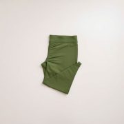 Flat lay of olive green scrunch legging, best scrunch bum leggings folded neatly on a neutral surface.