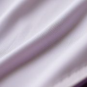 Close-up of the yoga bodysuit fabric, highlighting texture, stitching, and quality in the yoga jumpsuit.